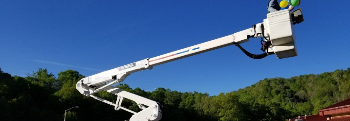 Lineworker in bucket truck