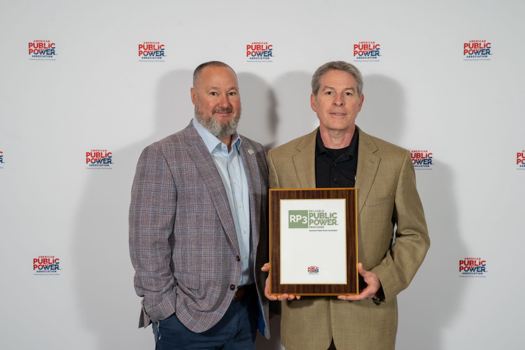NRLP General Manager Matt Makdad, right, poses with the RP3 plaque alongside Jeremy Ash, Chair of the RP3 Review Panel.