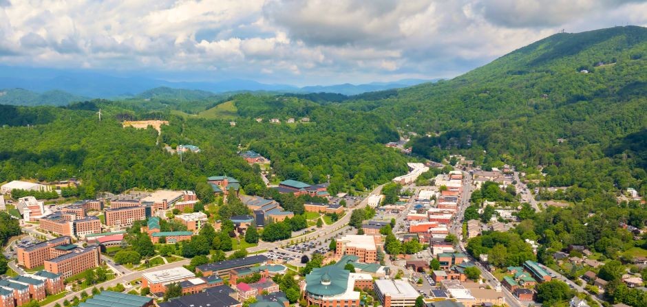 Aerial photo of Boone in the summer with mountains in the background