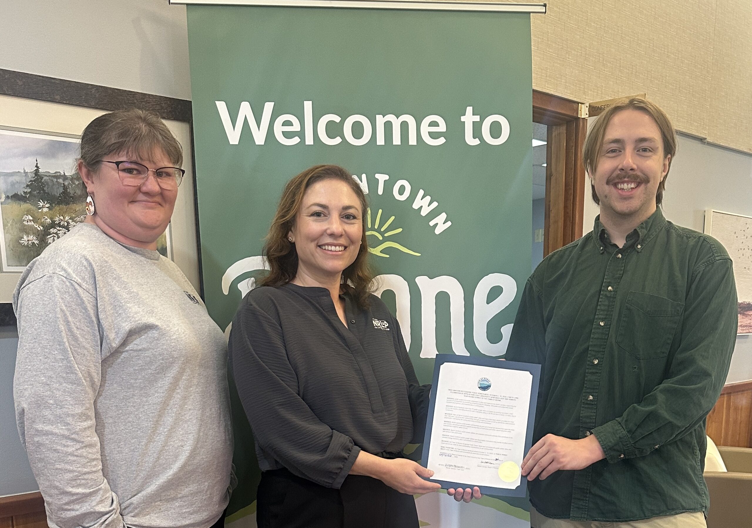 NRLP staff members and Town of Boone Mayor Dalton George pose for the camera